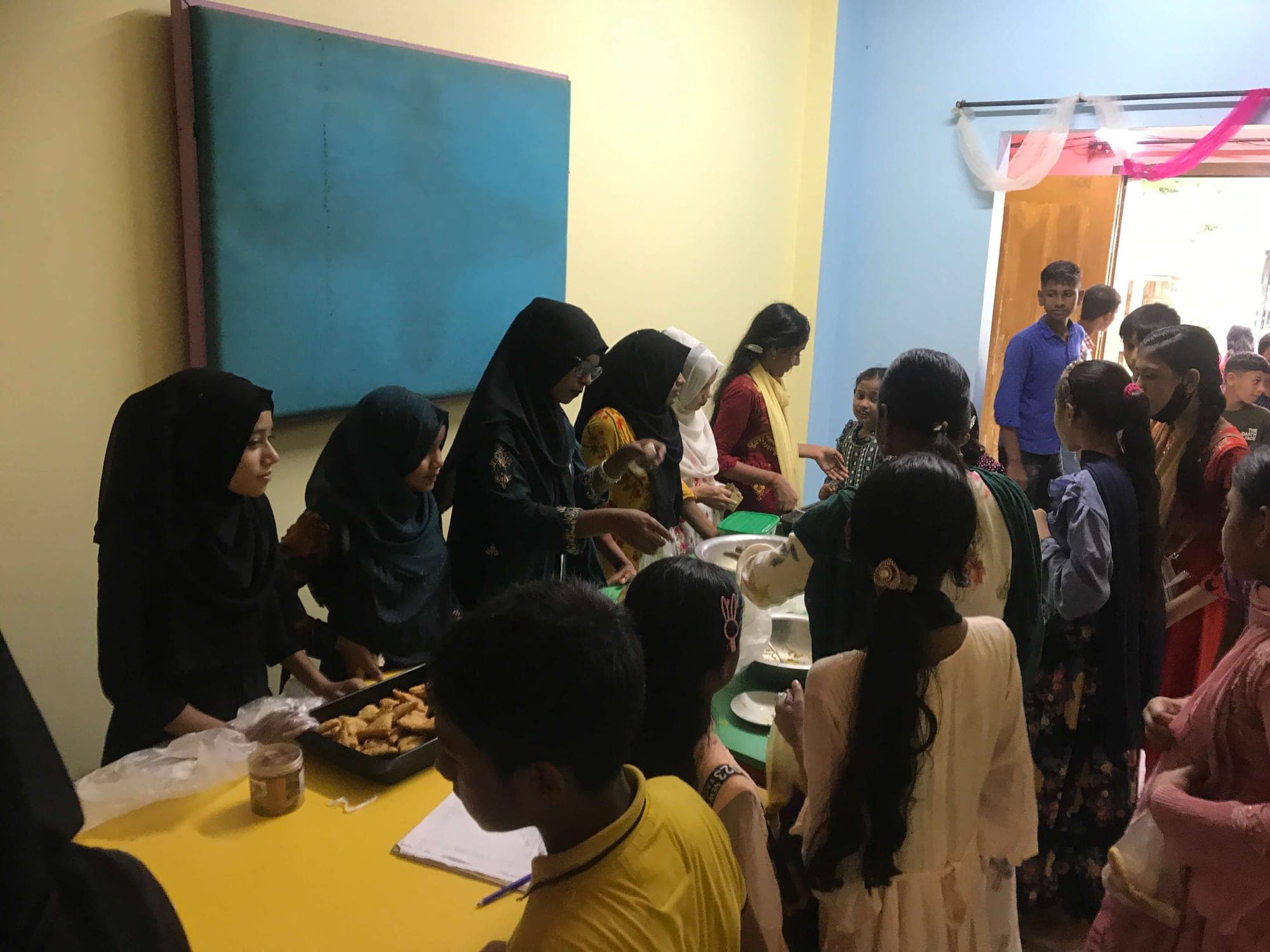Cooking students serving at an event