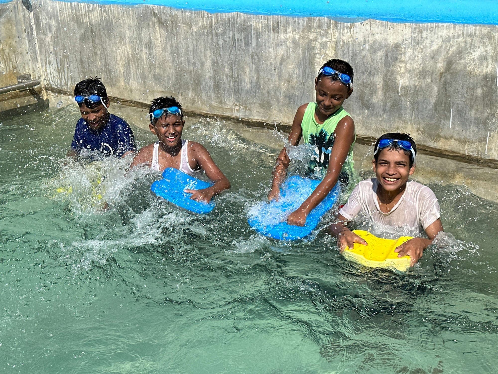 Students learning to swim at the CAFFE pool